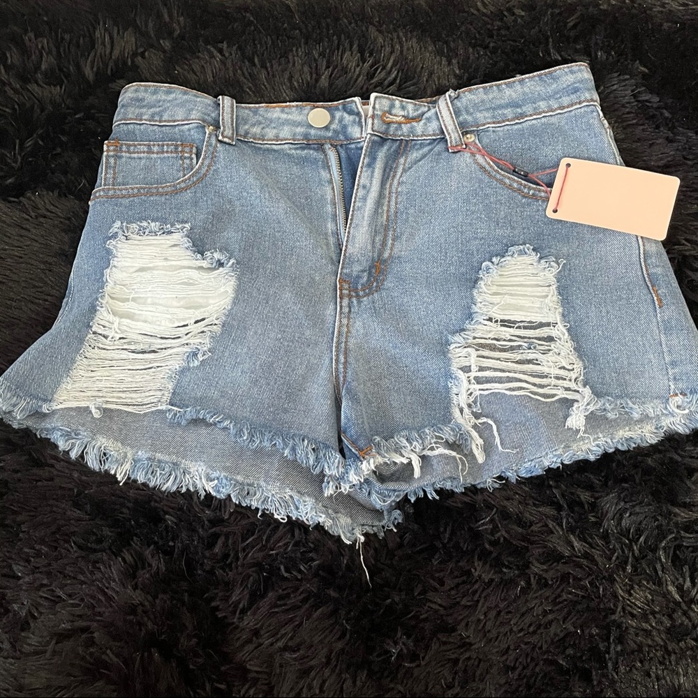 Ripped denim shorts